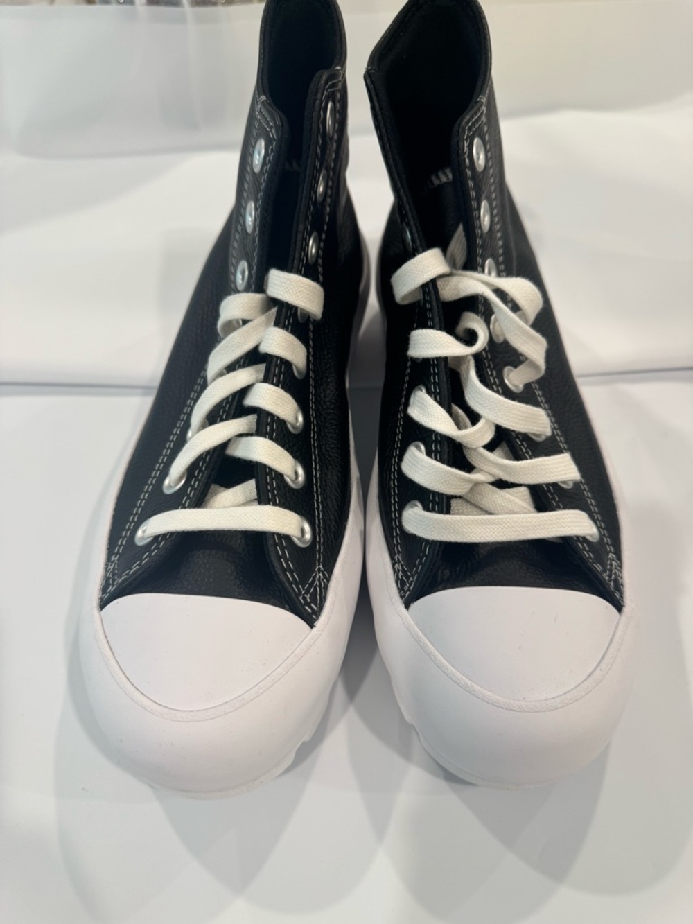 Black High-Top Leather Converse with White Toe Cap and Laces